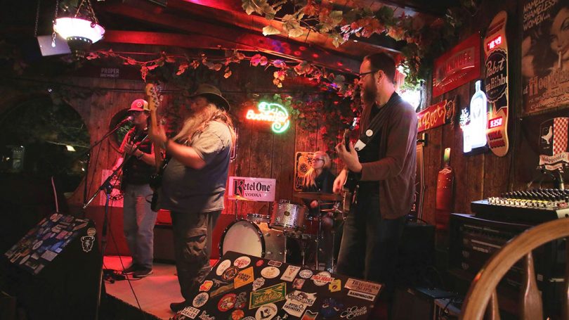 Photo of musicians playing at the Hog Wallow pub